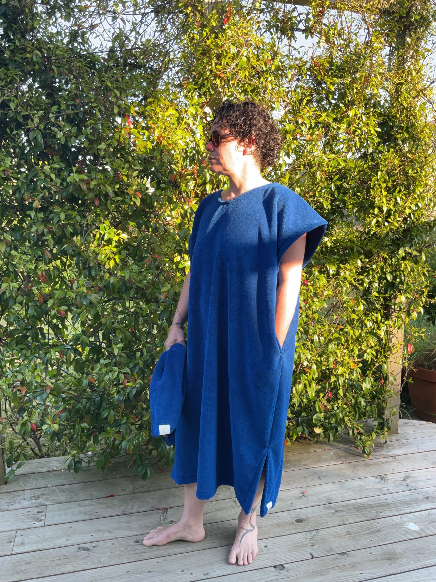 Cape de bain du Club des Q cachés